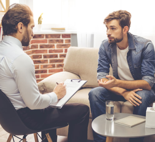 Man seeking advice to expert