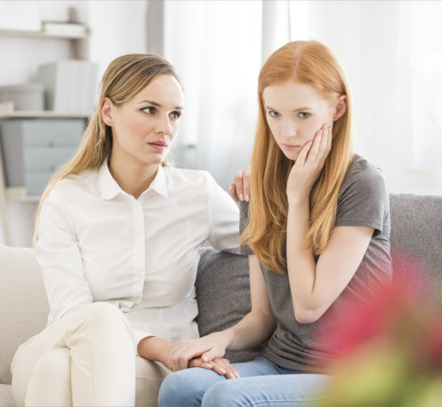 Woman comforting her peer